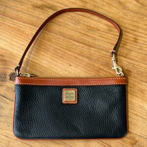 Dooney & Bourke black and tan leather wristlet/clutch